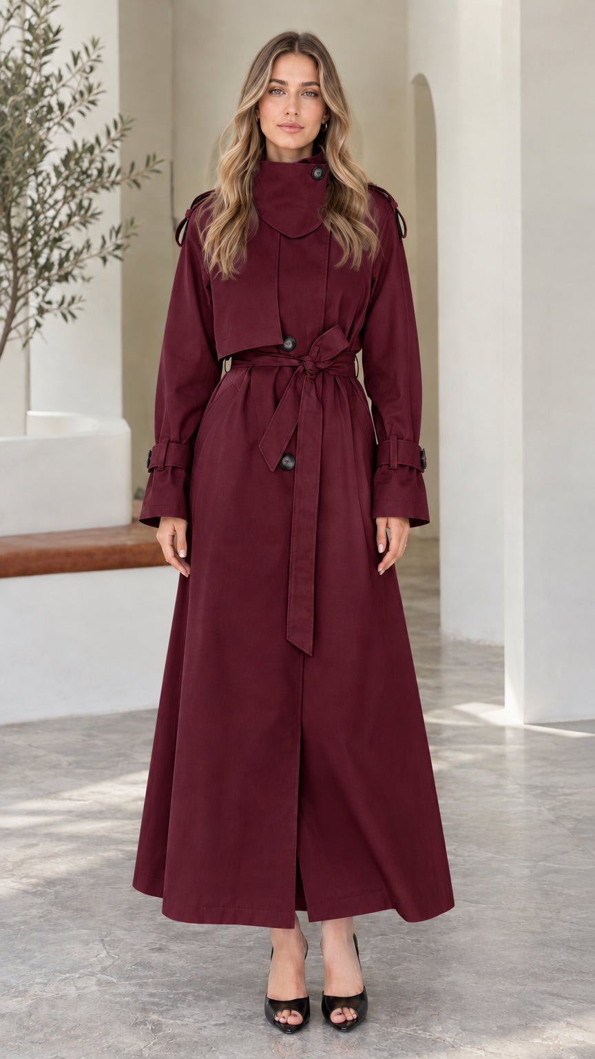 Front view of model wearing Burgundy wine high-neck maxi belted trench coat