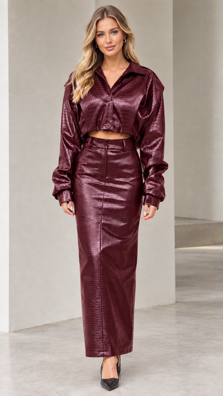 Model wearing burgundy wine crocodile embossed faux leather cropped jacket and maxi skirt set