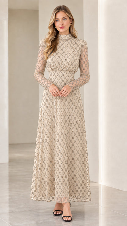 Front full view of woman wearing champagne beige geometric long sleeve maxi dress