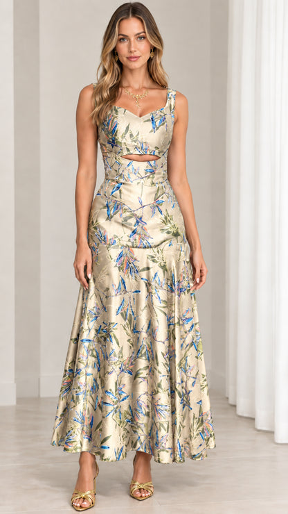 Front view of champagne gold floral print sleeveless cutout maxi dress