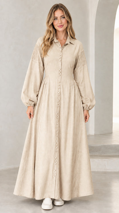 Front view of woman wearing beige oatmeal long sleeve button-down maxi dress