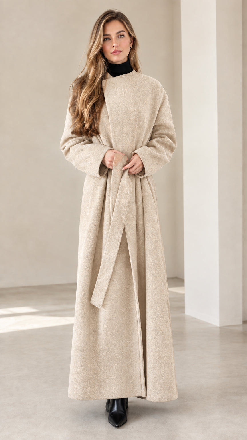 Model wearing cream beige maxi wrap coat with waist tie