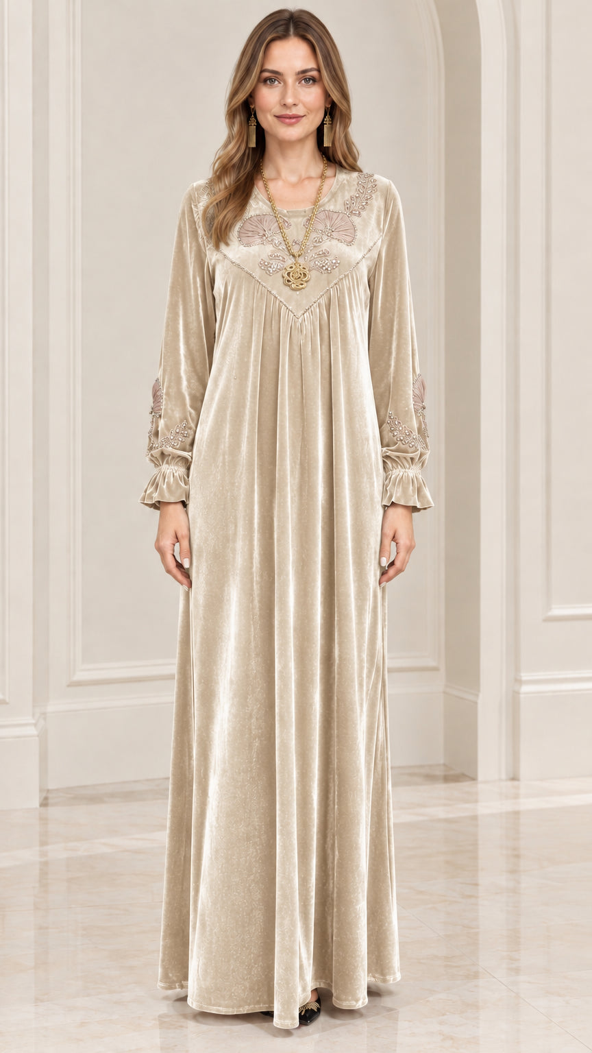 Front view of champagne beige velvet embroidered maxi gown