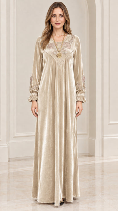 Front view of champagne beige velvet embroidered maxi gown