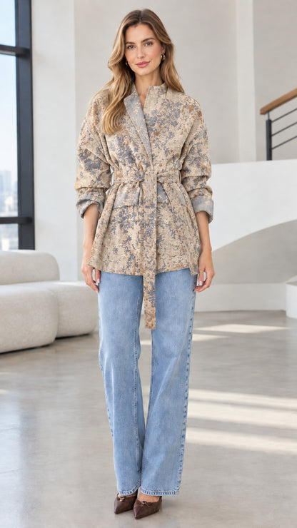 Model wearing oatmeal beige floral jacquard belted wrap jacket