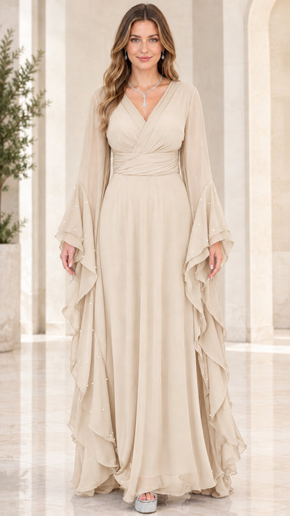 Front view of woman wearing Champagne beige V-neck chiffon maxi evening dress with bell sleeves