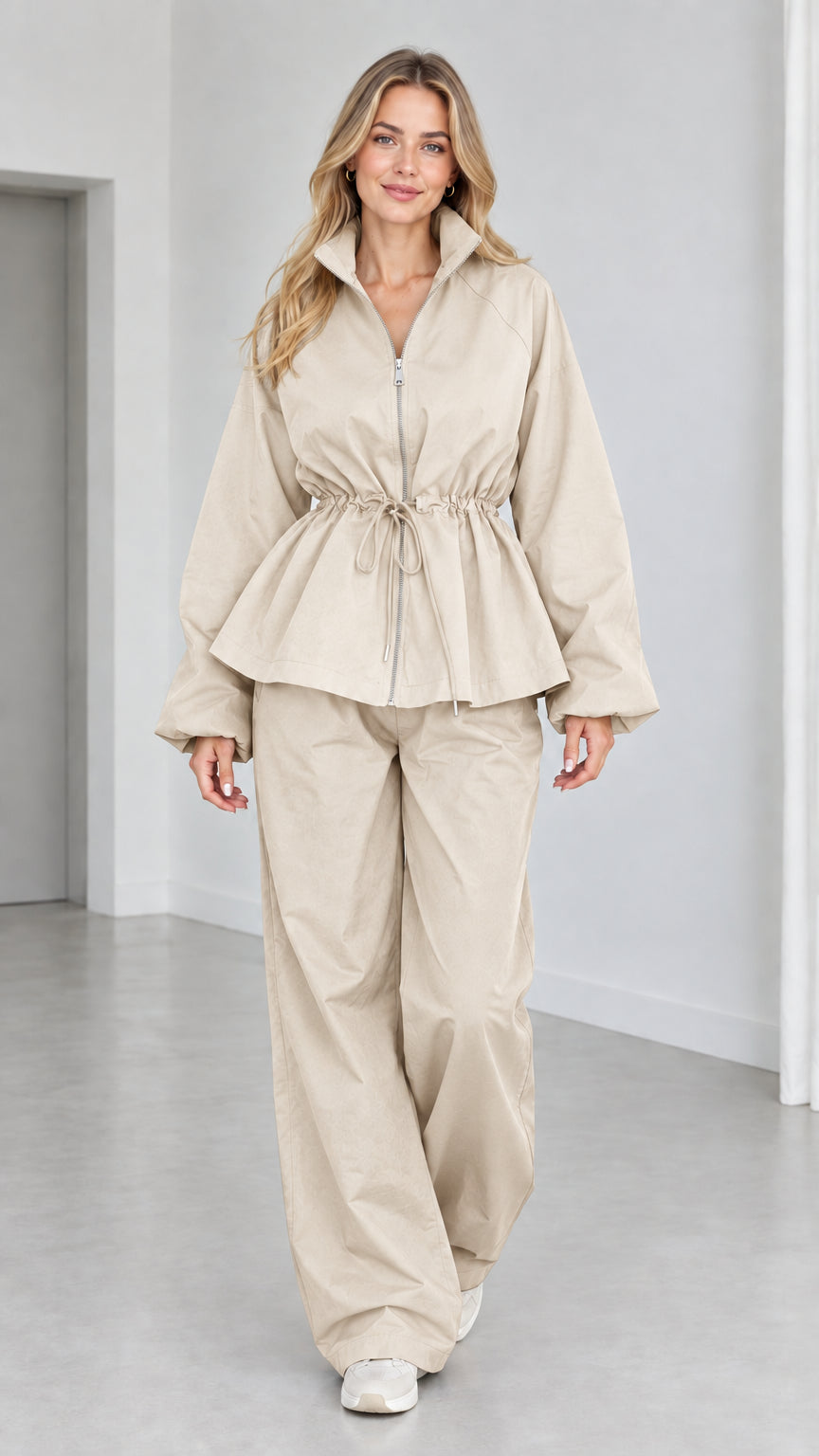Women's beige drawstring peplum jacket and wide-leg pants matching tracksuit set