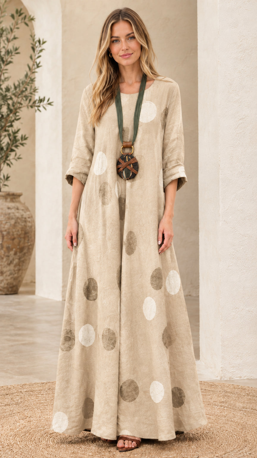 Woman wearing beige oatmeal polka dot relaxed fit maxi dress