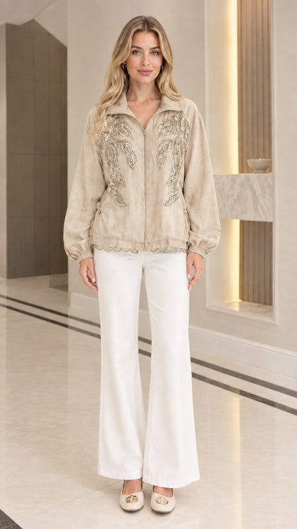 Front full-length view of woman wearing beige sequin embroidered lightweight jacket