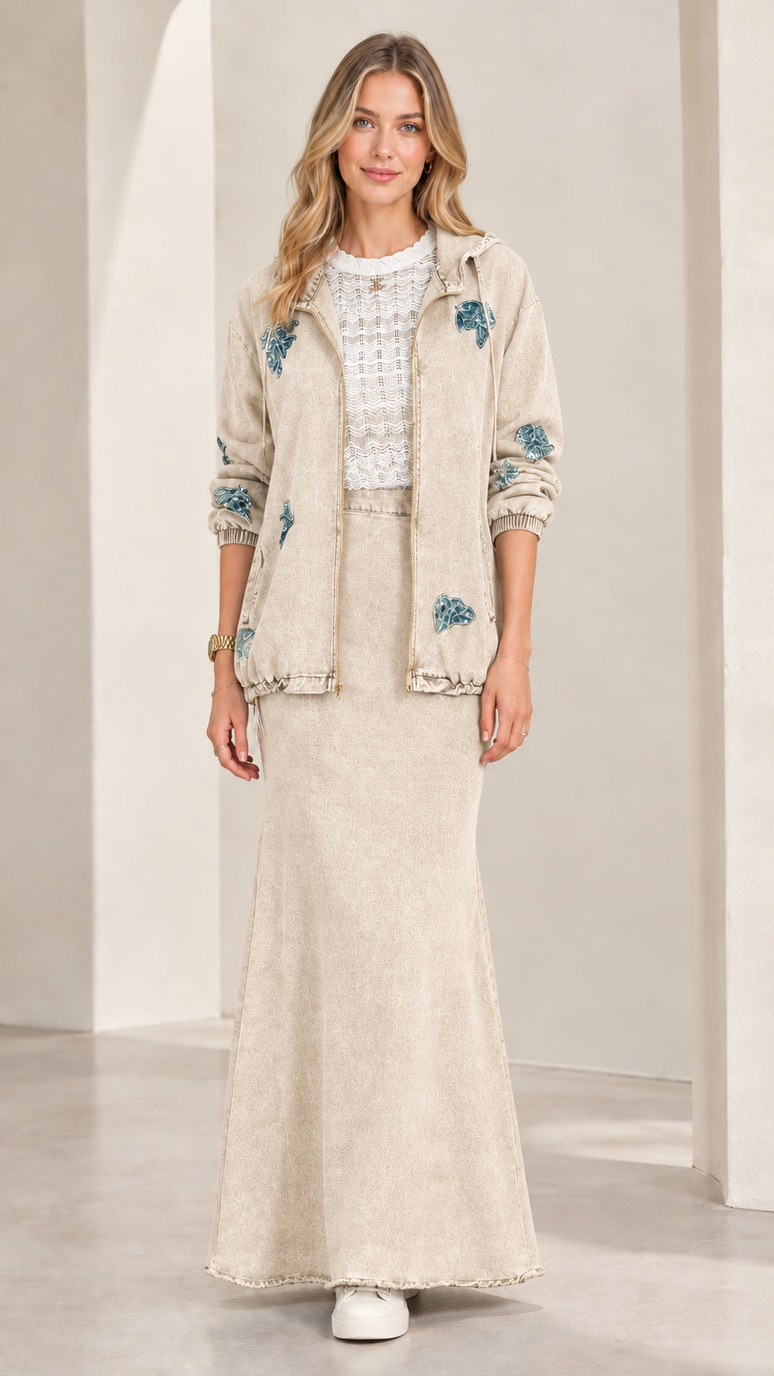 Front view of model wearing Beige hooded denim jacket and maxi skirt set