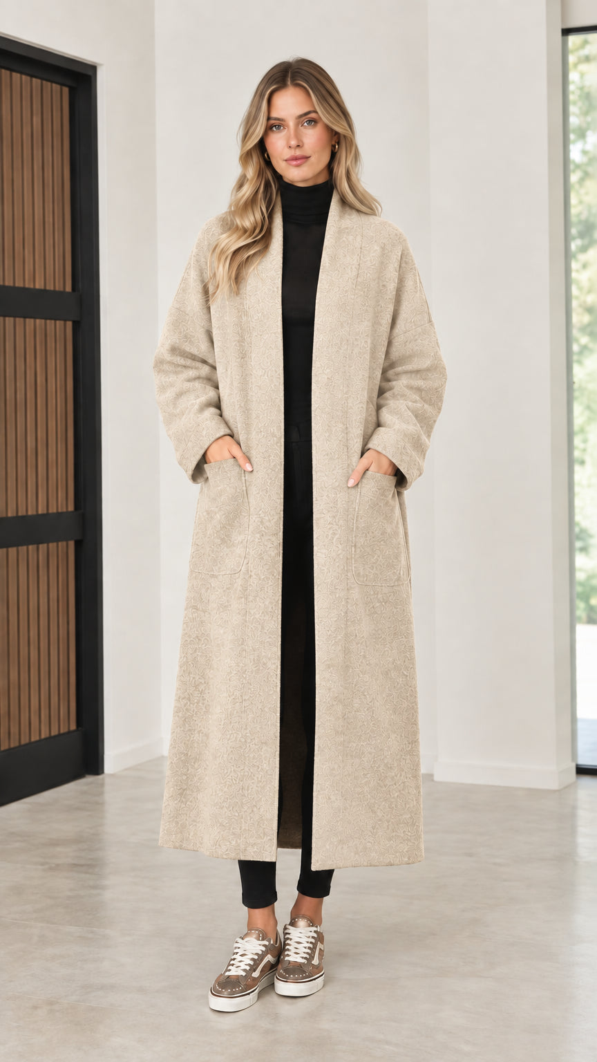Front view of model wearing oatmeal cream open front maxi coatigan