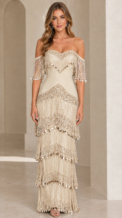 Full-length view of champagne gold off-the-shoulder tiered fringe maxi gown